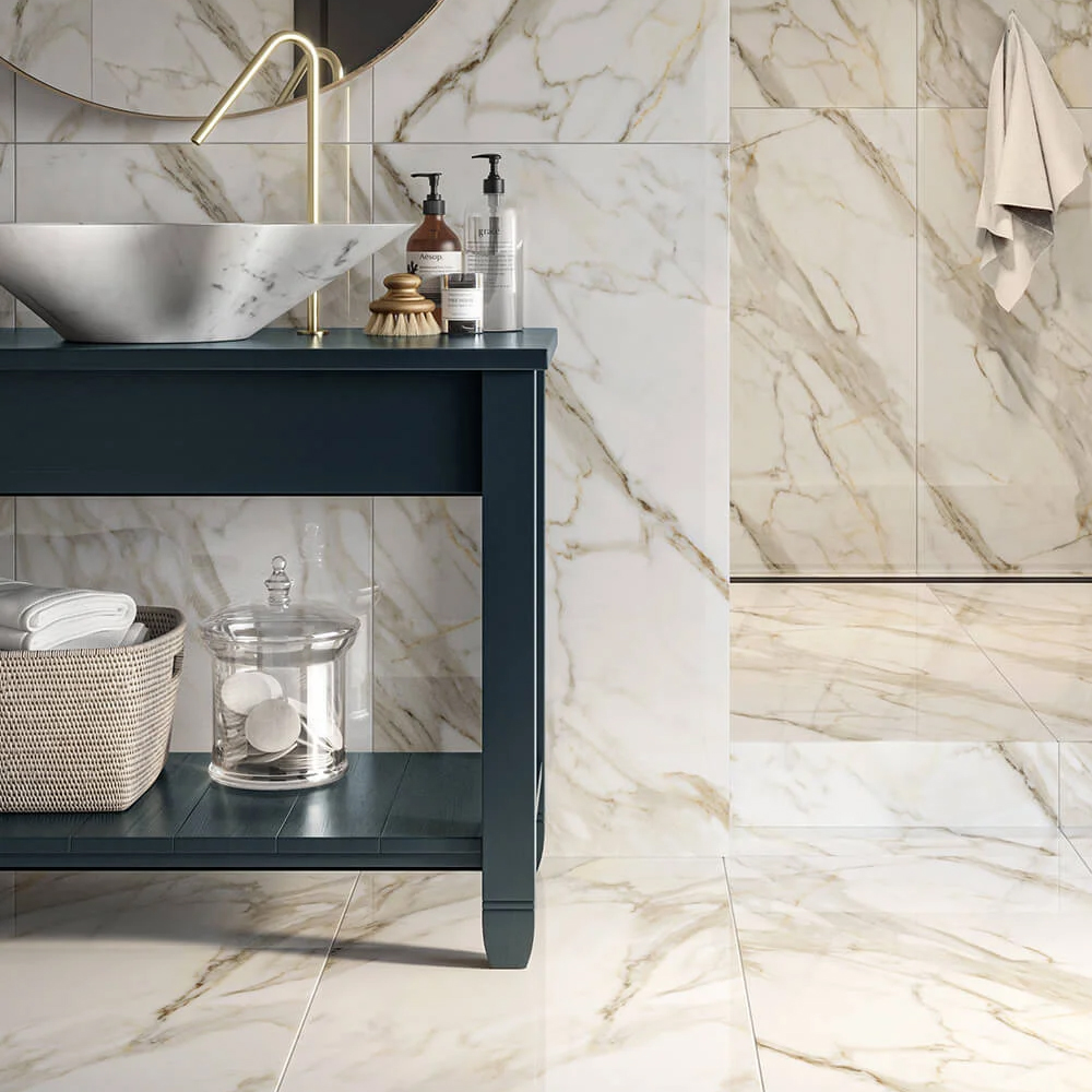 Polished marble-effect porcelain wall and floor tiles in a wet room bathroom